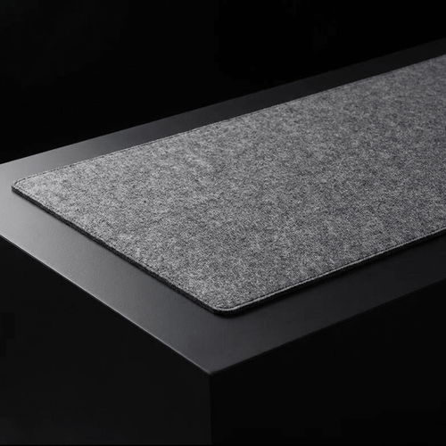 Sustainable dark gray felt desk mat for workspace organization